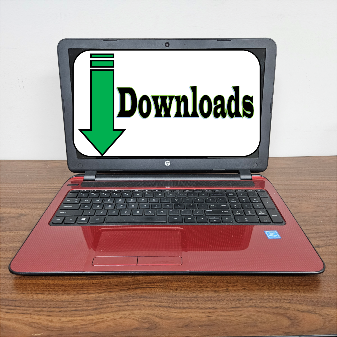 photo of laptop with downloads graphic